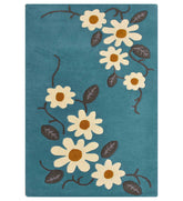 Teal floral hand-tufted wool rug with white daisy pattern